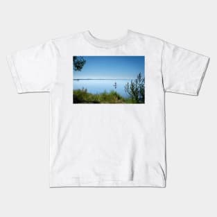 a lone board sailor in the quiet bay in the southern Öresund, on the Swedish side - SUP stand up paddle board Kids T-Shirt